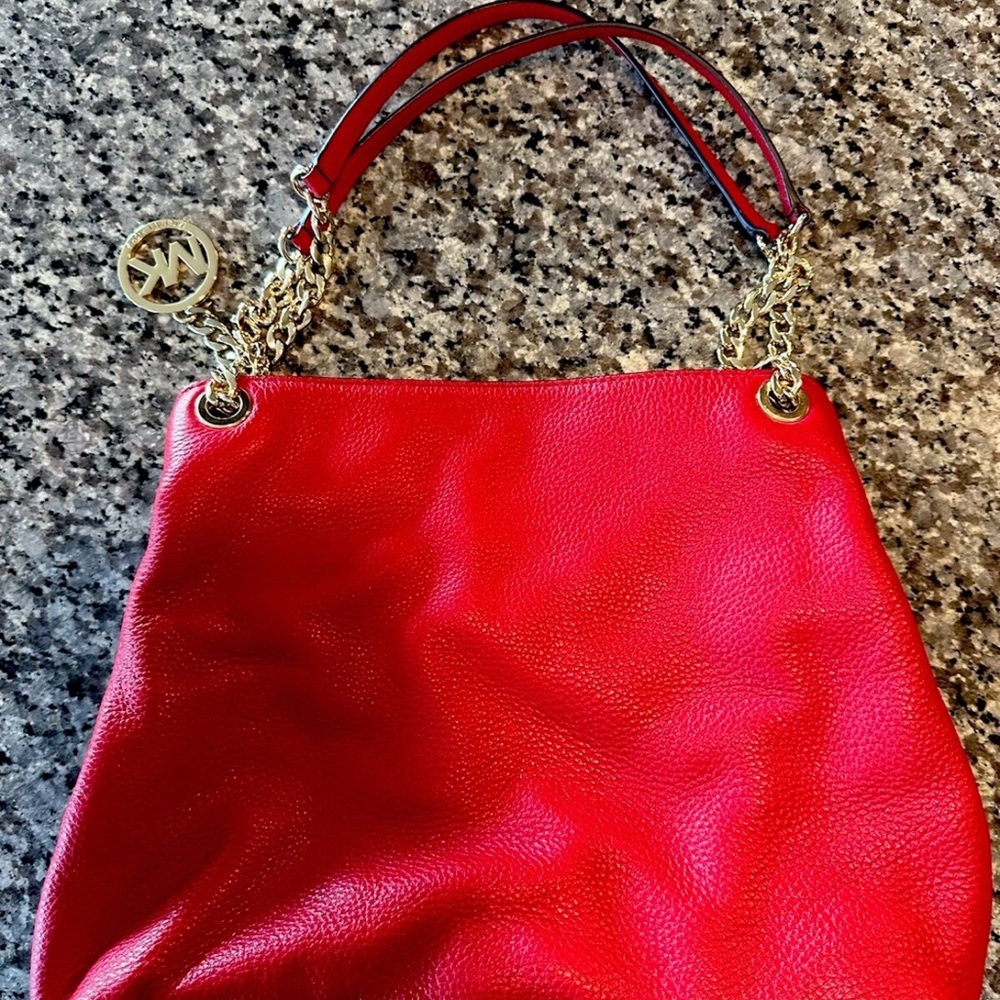 Michael Kors Raven Pebbled Leather Shoulder Bag
Authentic